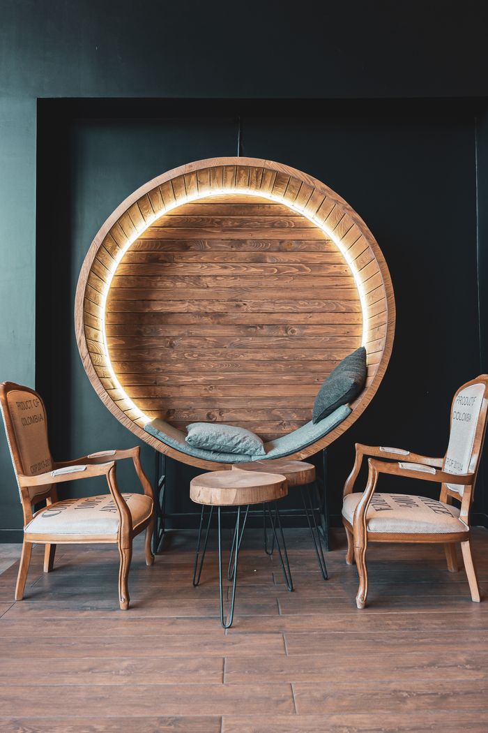 About Unique wooden circular chair seating with side chairs, modern design.