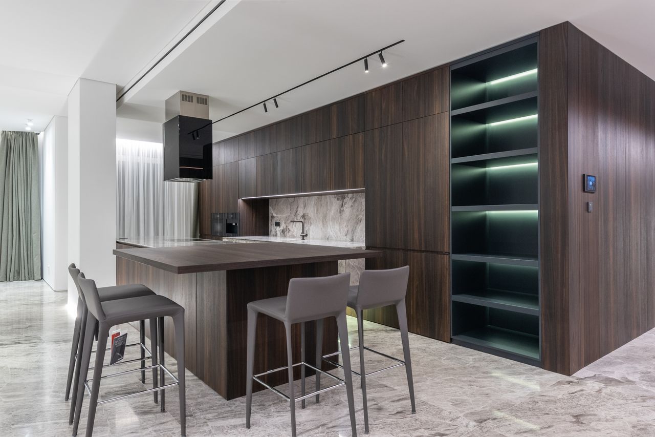 The Art of Drawing Readers In: Your attractive post title goes here Modern interior design of contemporary spacious kitchen with dining zone and wooden furniture in apartment